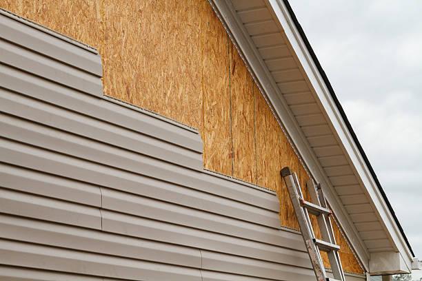 Professional Emergency Siding Repair technician working in Royersford, PA